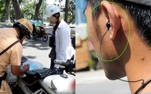 Đeo tai nghe, sử dụng điện thoại khi đi xe máy có thể bị phạt đến 14 triệu đồng