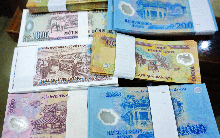 Người đổi tiền mới, tiền lẻ dịp Tết có thể bị phạt tới 40 triệu đồng, tịch thu toàn bộ tiền nếu vi phạm điều này