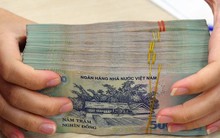 Doanh nghiệp trả lương từ 5 triệu đồng trở lên có bắt buộc chuyển khoản? Thuế TP Hà Nội trả lời