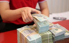 Vì sao các ngân hàng dồn dập tăng lãi suất huy động?