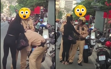 Giằng co với 2 CSGT giữa phố, giật tờ giấy xanh: Cô gái giải thích