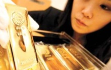 Giá vàng tăng vọt lên 1.415 USD/ounce