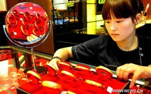 Vàng thế giới mất đà tăng