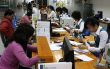 Thấy gì khi tiền của dân đang “lười” hơn?