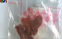 Người tiêu dùng hoang mang vì thịt lợn chuyển màu đỏ lạ sau khi luộc chín