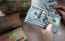 Tiền VND tăng giá so với USD Tiền VND tăng giá so với USD