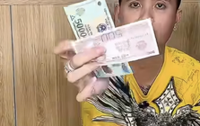 Cẩn trọng với chiêu trò đổi tiền mới, mua tiền xưa giá 500.000 đồng/tờ