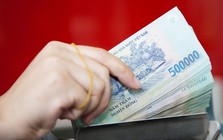 Nguyễn Kim Minh SN 1976 giao dịch thành công 20.000.000 đồng từ NH Agribank liền báo công an xác minh gấp