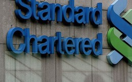Lợi nhuận ròng của Standard Chartered giảm 37% trong năm 2014