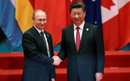 Tổng thống Nga Putin tặng kem cho Chủ tịch Trung Quốc Tập Cận Bình