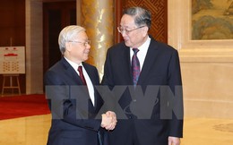 Tổng Bí thư hội kiến với Chủ tịch Chính Hiệp Trung Quốc