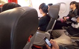 Khách vô tư sử dụng điện thoại trên máy bay, Cục Hàng không yêu cầu siết chặt