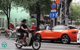"Soái ca BMW" bỏ xe giữa phố Sài Gòn giúp cụ già sang đường và cái vẫy tay dành cho tài xế taxi