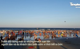 Nắng nóng đỉnh điểm, biển Đà Nẵng đông nghịt người giải nhiệt