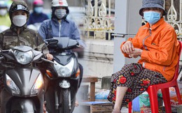 Chùm ảnh: Người dân Hà Nội mặc áo ấm, co ro khi ra đường trong đợt không khí lạnh đầu tiên