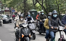 Người Hà Nội co ro trong mưa rét đầu đông