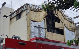 Vụ cháy quán karaoke ở Bình Dương: Cán bộ, chiến sĩ PCCC đội mưa tìm kiếm nạn nhân mắc kẹt