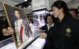 Ông Thaksin khuyên bà Yingluck nghỉ ngơi 1 năm?