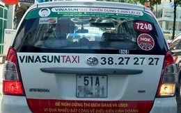 Tài xế taxi gỡ bỏ biểu ngữ phản đối Uber, Grab