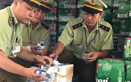 Thu giữ hơn 7 ngàn chai bia Heineken và 15 ngàn chai sữa Ensure có dấu hiệu vi phạm về an toàn thực phẩm