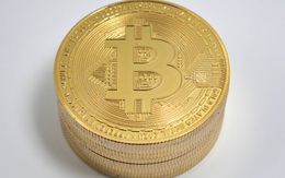Thị trường tiền ảo ‘rực cháy’, Bitcoin lại lao dốc
