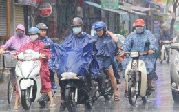 Ảnh: Cơn mưa vàng "xối xả" giải nhiệt cho Sài Gòn từ sáng sớm, chấm dứt chuỗi ngày nắng nóng kinh hoàng