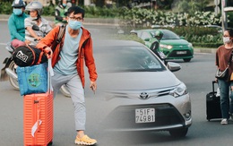 Khổ như hành khách ở Tân Sơn Nhất: "Đội" nắng mang vác hành lý ra đường đón xe công nghệ