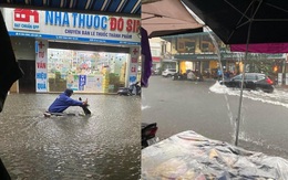 Hà Nội mưa lớn hơn 1 tiếng, đường phố ngập trong "biển nước", giao thông ùn tắc kéo dài