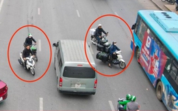 Xe máy nối đuôi nhau đi ngược chiều, cắt mặt ô tô trên đường Giải Phóng, Hà Nội