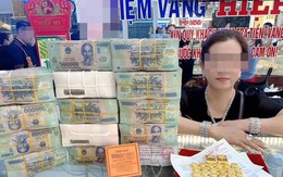 Thực hư một phụ nữ trúng số độc đắc 9 tỷ đồng, rạng rỡ mua vàng bên 'đống tiền'