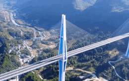 Người Trung Quốc xây cầu ‘đẻ ra tiền’ khiến thế giới ngỡ ngàng: Trồng trụ bê tông cao vượt tháp Eiffel để bắc 2.000 mét thép qua vực sâu