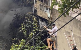 Vụ cháy ở Hà Nội: Người đàn ông mặc sơ mi trắng 'cứu người xong rồi đi làm luôn'