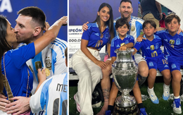 Messi khoá môi bà xã Antonella đầy ngọt ngào, cùng 3 quý tử được dàn vệ sĩ hùng hậu bảo vệ rời đi sau chức vô địch Copa America