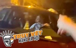 Sự thật về clip người đàn ông chạy ô tô trên nắp capo có một phụ nữ