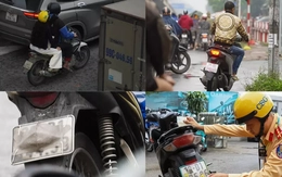 Muôn kiểu chiêu trò che biển né ‘mắt thần’ AI trên đường phố Hà Nội