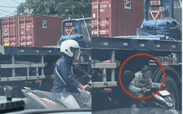 5 triệu người lạnh sống lưng khi xem clip 5 xe máy chui gầm container tránh tắc đường: Câu chuyện phía sau