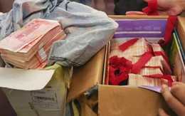 Phát hiện 3,6 tỷ đồng tiền mặt trong gói hàng của một người phụ nữ gửi cho 2 người lạ
