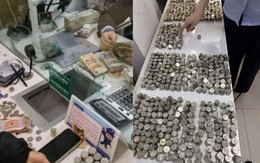 Người phụ nữ mang 4 tấn tiền trị giá 2,5 tỷ đồng đến ngân hàng gửi tiết kiệm: “Tôi chỉ bán tạp hoá ở cổng trường” Người phụ nữ mang 4 tấn tiền trị giá 2,5 tỷ đồng đến ngân hàng gửi tiết kiệm: “Tôi chỉ bán tạp hoá ở cổng trường”