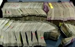 Tịch thu 12 tỷ đồng tiền mặt, 50 kg vàng la liệt từ nhà đến văn phòng của một doanh nhân ngành vận tải