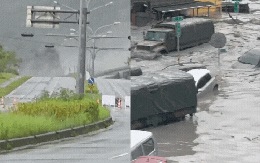 Clip kinh hoàng trong siêu bão Ragasa: Dòng bùn cuồn cuộn đổ ập khiến cả thị trấn chìm trong biển nước, người dân bám cột điện cầu cứu