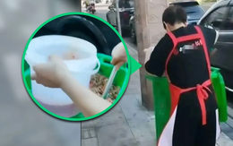 Phát hiện nhân viên quán lẩu múc dầu ăn từ thùng rác, chủ quán khẳng định để bán chứ không dùng nấu ăn