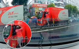 Công an TP.HCM truy xét người đàn ông đập kính, tấn công tài xế xe tải