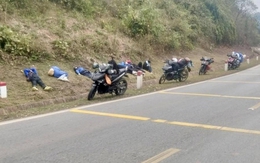 Người lao động ngủ gục bên đường sau khi chạy xe 400km về quê đón Tết: Bức ảnh gây tranh luận