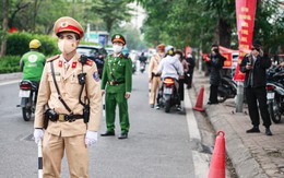 Uống rượu bia rồi dắt xe qua chốt kiểm soát của CSGT có bị phạt?