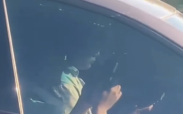 CSGT hoá trang, ghi hình tài xế ô tô dùng điện thoại khi lái xe