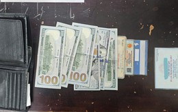 Phát hiện 6 tờ tiền mệnh giá 100 USD trong chiếc ví ở chân cầu Tham Lương, người đàn ông ở TP.HCM nhanh chóng báo công an