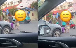 Xôn xao đoạn clip người phụ nữ quỳ giữa đường, van xin chủ ô tô sau va chạm giao thông