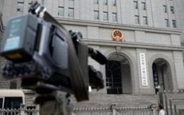 Nhà báo Tân hoa xã tố một quan chức Trung Quốc ăn hối lộ