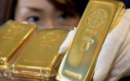 Giá vàng rớt mạnh về sát 1.300 USD/ounce