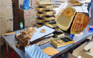 Đột kích kho hàng ở ngoại ô Trung Quốc, công an tịch thu 20.000 hộp bánh trung thu nhái nhãn hiệu lớn, triệt phá đường dây hàng giả 73 tỷ đồng